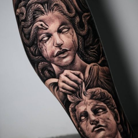 Black and grey Medusa sleeve tattoo