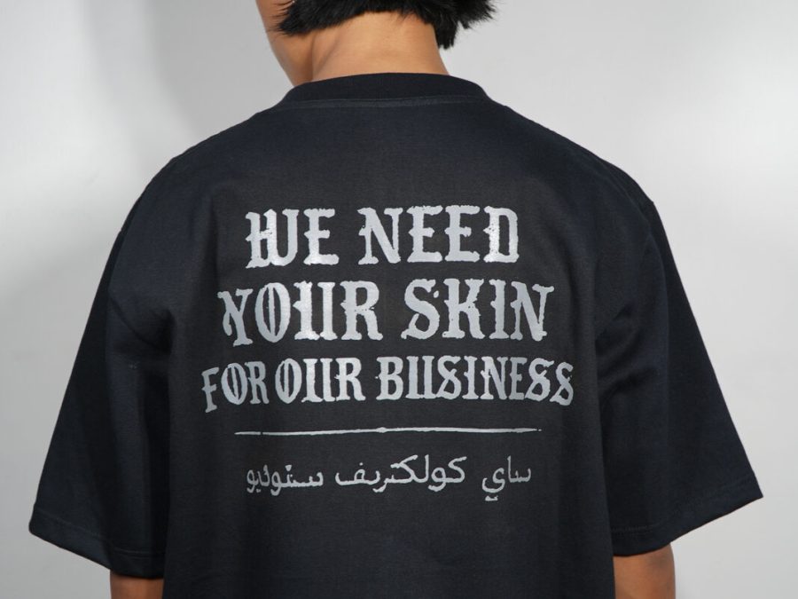 SAE Collective Studio t-shirt reading We Need Your Skin For Our Business