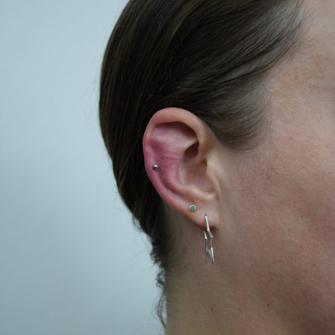 Helix and lobe piercing at SAE Collective Studio in Uluwatu, Bali