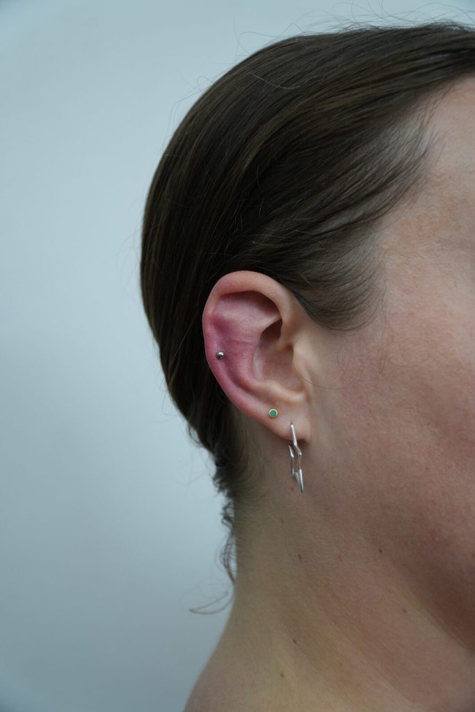 Helix and lobe piercing at SAE Collective Studio in Uluwatu, Bali