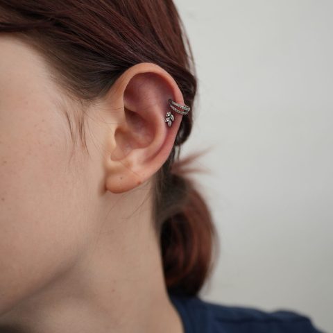 Industrial and helix piercing at SAE Collective Studio in Uluwatu, Bali