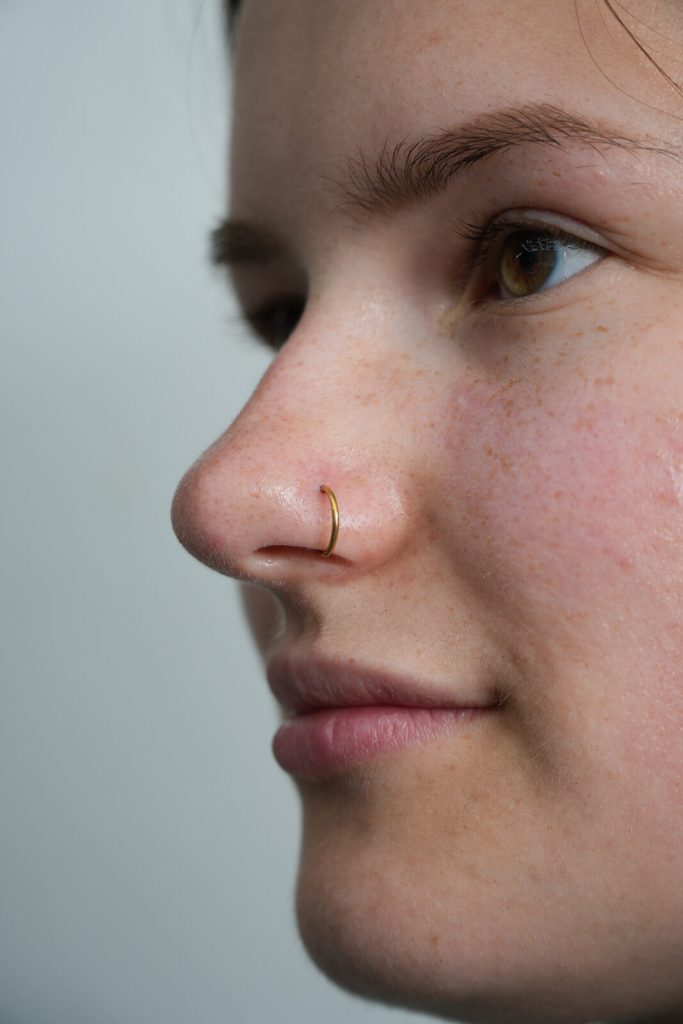 Nostril stud piercing at SAE Collective Studio in Uluwatu, Bali