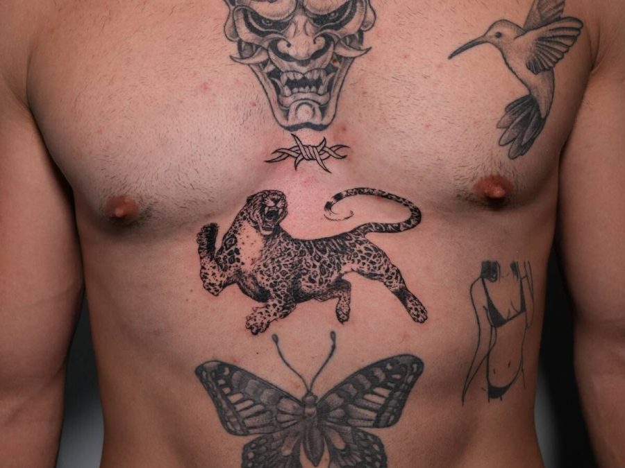 Traditional flash tattoos across a torso