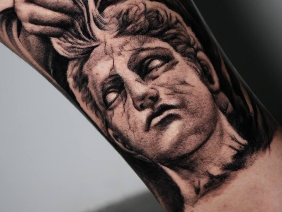 Realism statue portrait tattoo